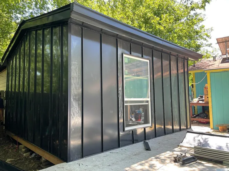 Black standing seam metal wall panels for Roof Inspection in Griffin