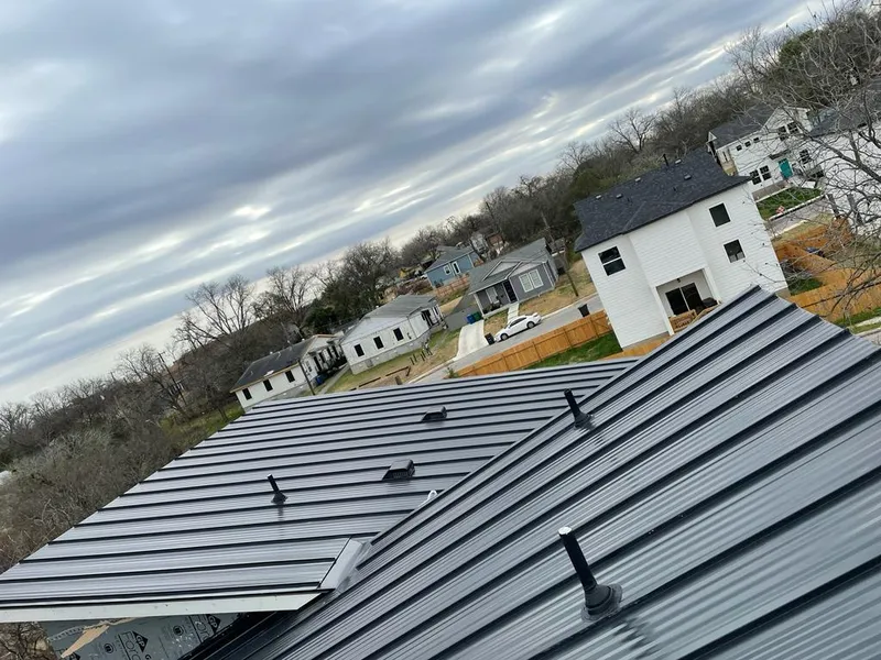 Standing seam metal roof panels with vents for Skylight Repair in Griffin